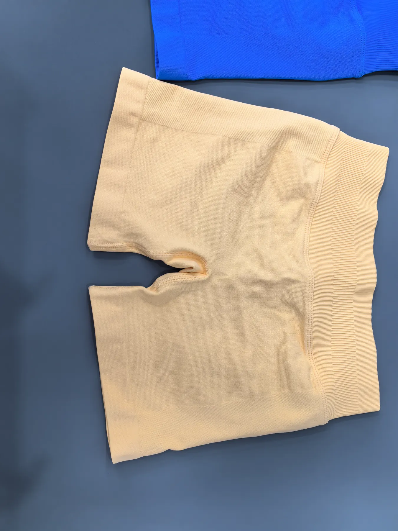 Flat-lay of the shorts, front view, showing the same gusseted crotch construction